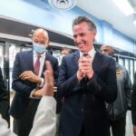 Group of people engaged in a lively discussion during a public event