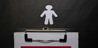 Clipboard with missing person sign and silhouette figure