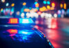 Police car lights at night street scene