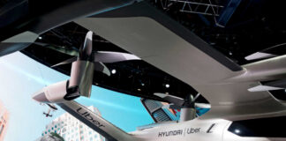 Futuristic air vehicle displayed at a technology event