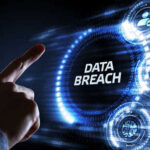 A hand pointing at the words 'DATA BREACH' surrounded by digital icons