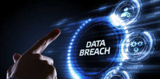 A hand pointing at the words 'DATA BREACH' surrounded by digital icons