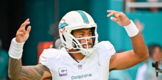 NFL player from the Miami Dolphins celebrating during a game