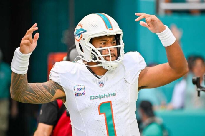 NFL player from the Miami Dolphins celebrating during a game