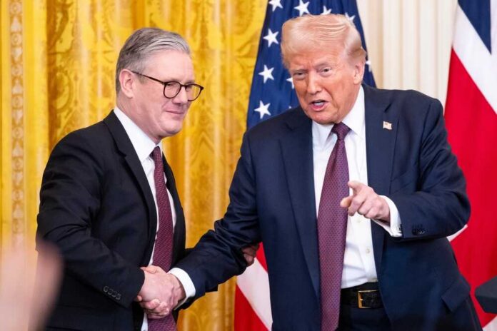 Two political leaders shaking hands during a formal meeting