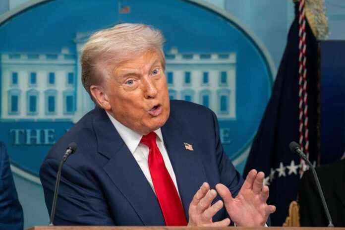 A government official speaking passionately at a press conference