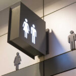 Restroom sign indicating male and female facilities
