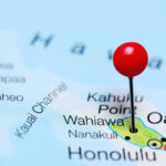 Dam Catastrophe Looms: Oahu Residents Flee A close-up of a map showing Oahu, Hawaii, with a red location pin