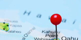 A close-up of a map showing Oahu, Hawaii, with a red location pin