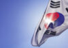 South Korean flag waving against a clear blue sky
