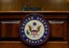 United States Senate emblem on wooden podium