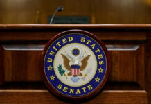 United States Senate emblem on wooden podium