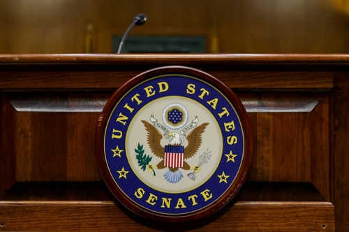 United States Senate emblem on wooden podium