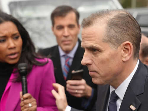 hunter-biden2431315473 People talking outside with microphones and phone visible