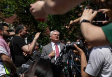 I dont know who they are surrounded by crowd