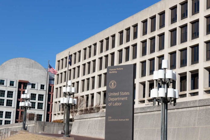 Exterior view of the United States Department of Labor building with flags