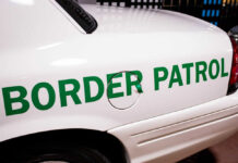 Close-up of a border patrol vehicle with green lettering