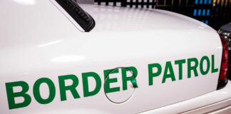 Close-up of a border patrol vehicle with green lettering