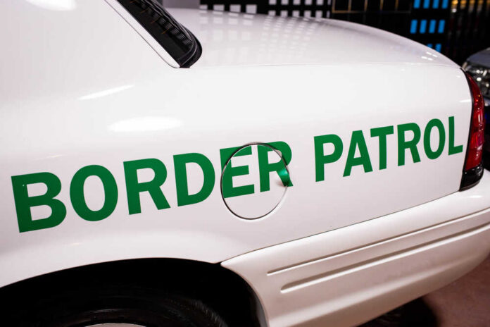 Close-up of a border patrol vehicle with green lettering