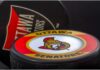 Close-up of an Ottawa Senators hockey puck