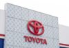 Close-up of the Toyota logo on a building facade