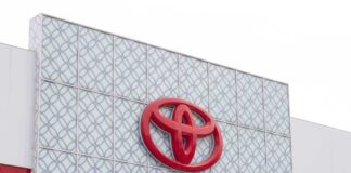Close-up of the Toyota logo on a building facade