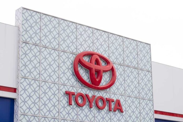 Close-up of the Toyota logo on a building facade
