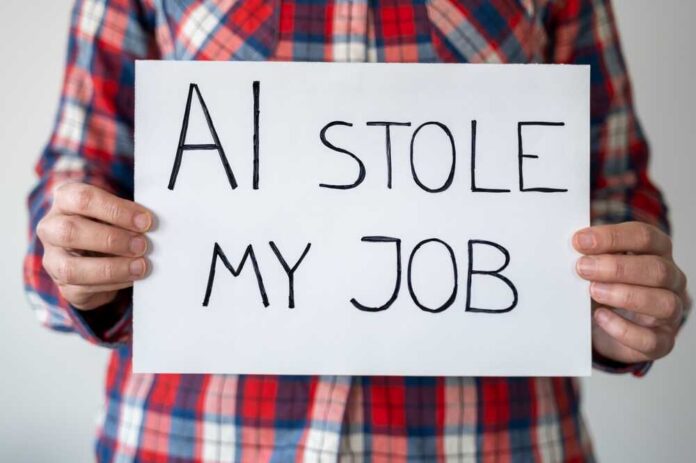 Person holding a sign that reads 'AI stole my job'