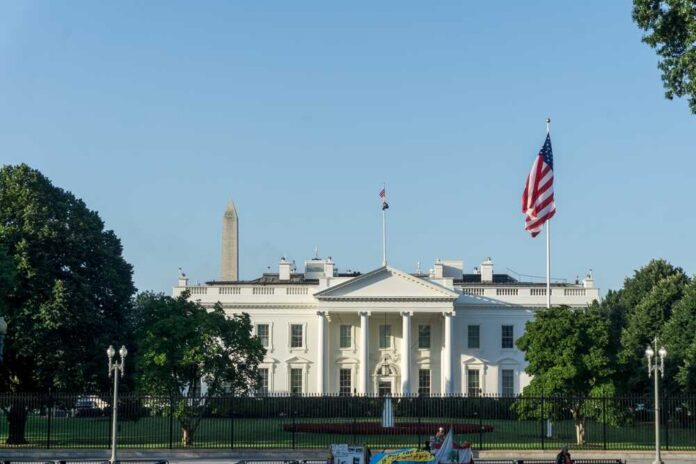 The White House with the Washington Monument in the background