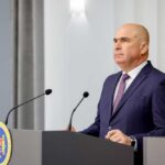 PSD Pullout Threat: Will Romania’s Government Collapse? A government official speaking at a press conference