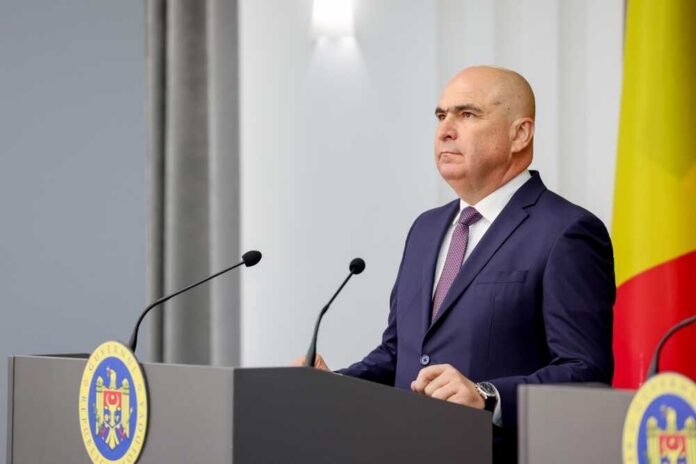 A government official speaking at a press conference