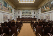 Liberal Takeover: Wisconsin Court’s New Power Play Interior view of a courtroom with wooden benches and large murals
