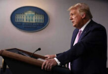 Pharmaceutical Chaos: What Trump’s Tariffs Mean for You Man speaking at a podium in a room