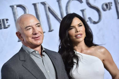 A man and woman at a formal event.