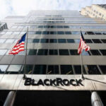 Investor Fury: BlackRock’s Hidden Valuation Tricks Modern skyscraper with BlackRock sign and American flags