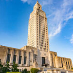 Shocking Court Order: Louisiana Redistricting Crisis Louisiana State Capitol building towering against a blue sky