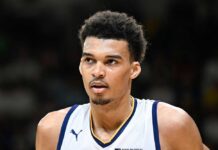 Close-up of a basketball player with a focused expression during a game