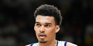 Close-up of a basketball player with a focused expression during a game