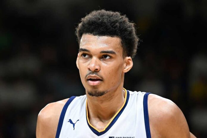 Close-up of a basketball player with a focused expression during a game
