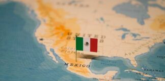 Map highlighting Mexico with a small flag