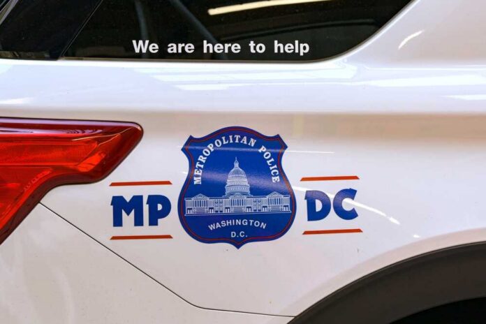 Side view of a Metropolitan Police vehicle with a help message