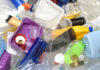 A pile of assorted plastic containers and bottles
