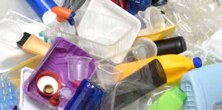 A pile of assorted plastic containers and bottles