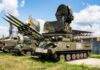 Tracked military surface-to-air missile launcher with radar