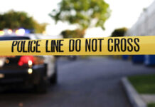 Shoplifting Standoff Becomes Street Horror Yellow police tape with text police line do not cross