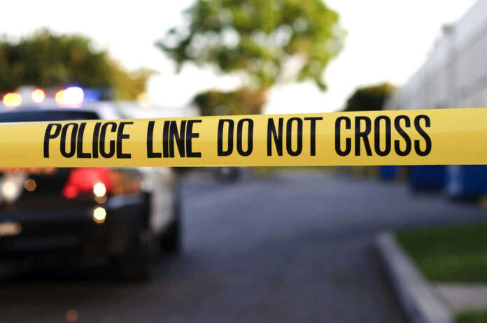crime-scene-24948199-1 Yellow police tape with text police line do not cross