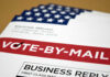 Fraud Alarm Blares—Proof Still Missing Vote-by-mail envelopes with U.S. flag design