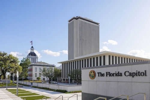 The Florida Capitol building under a clear sky