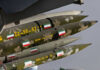 Cluster of camouflaged missiles mounted on a launcher