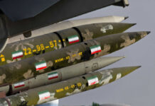 Cluster of camouflaged missiles mounted on a launcher